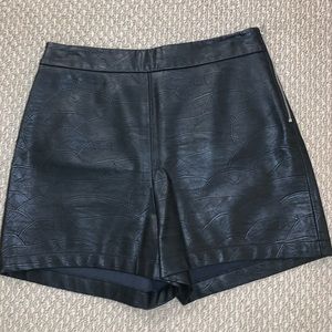 Black leather shorts